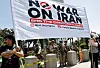 Demonstrators gather near U.S. Marines guarding the Wilshire Federal Building during a rally opposing the United States' strikes on Iran on June 22 in Los Angeles, California. [AFP/YONHAP]