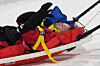 Canada's Cassie Sharpe blows kisses as medics stretcher her off after crashing during the women's freestyle skiing halfpipe qualifications at the 2026 Winter Olympics in Livigno, Italy, on Feb. 19. [AP/YONHAP]