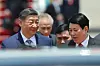 Chinese President Xi Jinping, left, speaks with Vietnam's President Luong Cuong on his arrival at the Noi Bai International Airport in Hanoi, Vietnam, on April 14. [AP/YONHAP]