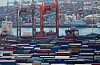 Containers are stakcked at a pier in the port city of Busan on Wednesday. [YONHAP]