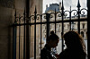 Tourists take photo withn their mobile phone to the Louvre pyramid courtyard after the announcement that the museum will remain closed for a second day following thieves stole priceless jewels from the museum in Paris a day earlier, in Paris on Oct. 20. [AFP/YONHAP]
