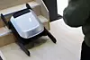 A robot vacuum descends stairs at the Dreame booth at CES 2026 in Las Vegas on Jan. 7. [YONHAP]