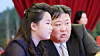 Kim Ju-ae, left, and her father, North Korean leader Kim Jong-un, attend a road completion ceremony on May 15. [KOREAN CENTRAL NEWS AGENCY]