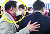Shaman Jeon Seong-bae, also known as “Geonjin,” left, is seen with former President Yoon Suk Yeol, right, at an event in Yeouido, western Seoul, in January 2022. [SCREEN CAPTURE]