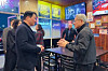SK Group Chairman Chey Tae-won, left, speaks with Nvidia Chief Executive Officer Jensen Huang at a Korean restaurant in Silicon Valley, California, on Feb. 5.  [YONHAP]