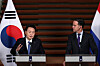 President Yoon Suk Yeol, left, speaks at a joint press briefing with Dutch Prime Minister Mark Rutte after their bilateral summit at Rutte's office in The Hague on Wednesday. [JOINT PRESS CORPS]