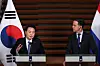 President Yoon Suk Yeol, left, speaks at a joint press briefing with Dutch Prime Minister Mark Rutte after their bilateral summit at Rutte's office in The Hague on Wednesday. [JOINT PRESS CORPS]