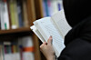 A person reads a book at a bookstore in Seoul on Nov. 13, 2025. [YONHAP]