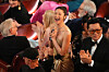 EJAE cheers in the audience after ″KPop Demon Hunters″ (2025) wins the award for best animated feature film during the Oscars on March 15 at the Dolby Theatre in Los Angeles. [AP/YONHAP]