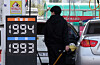 A driver fuels a car at a gas station in Seoul on April 23. [NEWS1]