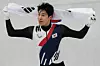 Korea's Hwang Dae-heon celebrates after winning a silver medal in the men's 1,500-meter final at the 2026 Milan-Cortina Winter Olympics in Milan on Feb. 14. [AP/YONHAP]