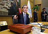 Bank of Korea Gov. Shin Hyun-song holds up a gravel during the Monetary Policy Board meeting at the Bank of Korea in Jung District, central Seoul, on May 28. [JOINT PRESS CORPS]