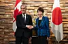 Canadian Prime Minister Mark Carney shakes hands with Japanese Prime Minister Sanae Takaichi in Tokyo on March 6. [AP/YONHAP]