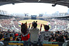 Doosan Bears fans cheer during a KBO preseason game against the Kia Tigers at Jamsil Baseball Stadium in Songpa District, southern Seoul, on March 22. [NEWS1]