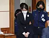Kim Keon Hee, the wife of former President Yoon Suk Yeol, attends her first trial at the Seoul Central District Court in Seocho District, southern Seoul, on Sept. 24, 2025. She had been indicted and detained on charges including stock manipulation involving Deutsche Motors, political interference and taking bribes connected to the Unification Church. [JOINT PRESS CORPS]