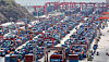 Containers ready for export are seen piled up at a port in Busan on March 31. [NEWS1]