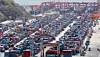 Containers ready for export are seen piled up at a port in Busan on March 31. [NEWS1]