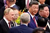 Chinese President Xi Jinping, center, Russian President Vladimir Putin, left, and North Korean leader Kim Jong-un arrive for a reception marking the 80th anniversary of the end of World War II at the Great Hall of the People in Beijing on Sept. 3, 2025. [REUTERS/YONHAP]