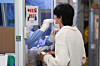 A person gets tested for Covid-19 virus at a public health facility in central Seoul in August 2023. [YONHAP]