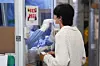 A person gets tested for Covid-19 virus at a public health facility in central Seoul in August 2023. [YONHAP]