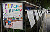 Handwritten notes written by students asking for understanding over noise ahead of a school athletic event are posted on a wall near an elementary school in, Seongnam, Gyeonggi. [SCREEN CAPTURE]