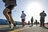 Runners take part in a marathon in Paju, Gyeonggi, on Nov. 2, 2025. [YONHAP]
