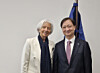 Lee Chan-jin, right, governor of Korea's Financial Supervisory Service, poses for a photo with Christine Lagarde, president of the European Central Bank, in Basel, Switzerland, on March 11. [FINANCIAL SUPERVISORY SERVICE]