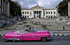 An old car drives past the University of Havana on May 13. Since February, the fuel crisis in Cuba, marked by the oil blockade imposed by the United States, has left universities without in-person classes. [AFP/YONHAP]