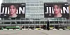 An advertisement for Netflix’s “BTS The Comeback Live: Arirang” livestream is displayed on digital billboards on the KT headquarters building in Gwanghwamun, central Seoul, on March 15. [NEWS1]