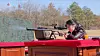 North Korean leader Kim Jong-un's daughter Kim Ju-ae aims at a target with a sniper rifle at a firing range on Feb. 27 in this screen grab from the North's official Korean Central Television released on the following day. [YONHAP]
