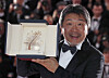 Hirokazu Kore-eda poses during the Award Winners photocall after winning the Palme d'Or Prize for 'Shoplifters' (2018) at the 71st annual Cannes Film Festival in Cannes, France, in May 2018. [EPA/YONHAP]