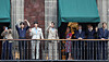 Members of BTS and Mexico's President Claudia Sheinbaum, far right, react as they stand on a balcony of the National Palace ahead of a series of concerts on the BTS World Tour ″Arirang″ in Mexico City, Mexico, May 6. [REUTERS/YONHAP]