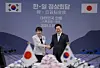 President Lee Jae Myung, right, shakes hands with Japanese Prime Minister Sanae Takaichi during a summit held in Andong, North Gyeongsang, on May 19. [JOINT PRESS CORPS]