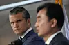 U.S. Defense Secretary Pete Hegseth, left, looks on as Korean Defense Minister Ahn Gyu-back speaks during a joint press conference following the 57th Security Consultative Meeting at the Defense Ministry in central Seoul on Nov. 4, 2025. [AP/YONHAP]
