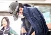 The man suspected of breaking into actor Kim Gyu-ri's home and committing robbery arrives with his head bowed at the Seoul Central District Court in Seocho District, southern Seoul, for a predetention hearing on May 22. [NEWS1]