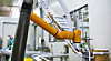 A collaborative robot made by Hanwha Robotics places ice cream into a container at Benson's manufacturing facility in Pocheon, Gyeonggi. [BETTER SCOOP CREAMERY]