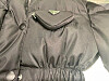 A padded jacket from Prada, purchased by a Korean customer in November 2023, is seen in this photo with white discoloration spots. [YONHAP]