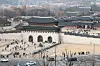 Visitors walk around the entrance of Gyeongbok Palace in Jongno District, central Seoul, on Dec. 28, 2025. [YONHAP]