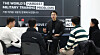 A startup representative, center, speaks to job seekers at an employment exposition held in Coex in southern Seoul in January. [YONHAP]