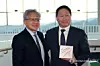 SK Group Chairman Chey Tae-won, right, poses with Nvidia CEO Jensen Huang at the APEC CEO Summit in Gyeongju, North Gyeongsang, on Oct. 31, 2025. [YONHAP]