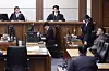 Former first lady Kim Keon Hee, second from right, listens to a verdict during a sentencing hearing on charges of bribery, stock price manipulation and political interference at the Seoul Central District Court in Seocho District, southern Seoul, on Jan. 28 in this footage streamed live by the court. [SCREEN CAPTURE]