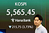 A screen in Hana Bank's trading room in central Seoul shows the Kospi opening on March 23. [NEWS1]