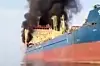 The Palau-flagged oil tanker Skylight, under U.S. sanctions, is seen engulfed in flames after being struck off the Musandam Peninsula of Oman, in this video grab taken from UGC images posted on social media on March 1. [AFP/YONHAP]