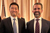 Coupang Inc. Chairman Kim Bom, left, poses for a photo with Donald Trump Jr. during a reception in Washington on Jan. 19. [YONHAP]