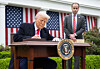 U.S. President Donald Trump signs an executive order after delivering remarks on reciprocal tariffs during an event in the Rose Garden entitled ″Make America Wealthy Again″ at the White House in Washington on April 2, 2025. [AFP/YONHAP]
