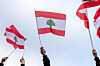 People wave Lebanese flags during a vigil on April 10 in Dearborn, Michigan. [AP/YONHAP]