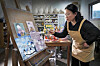 Ceramic painter Kim Eun-kyung paints on a white porcelain slab at her studio in Seorak-myeon, Gapyeong County, Gyeonggi. [PARK SANG-MOON]