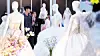 Visitors at a wedding fair at Coex in Gangnam District, southern Seoul, look at wedding dresses on July 6, 2025. [NEWS1]