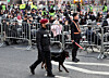 A police special operations officer conducts a search with an explosive detection dog at Gwanghwamun Square in Jongno District, central Seoul, on March 21, the day of BTS’s comeback performance. [NEWS1]