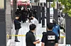 Police officers investigate Shinsegae Department Store's flagship branch in Jung District, central Seoul, on Aug. 5, 2025, following an online bomb threat. [YONHAP]